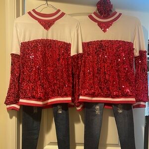 Weissman dance costumes. Hot pink & white sequined tops w/ stretch leggings.